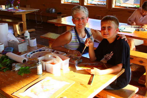 Jack and Judy Florell, long time and repeat winter guest, painting in the dining room during a painting retreat organized by Judy, this week