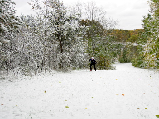 Jake skiing up Suicide Hill, logging the first ski of the year. 