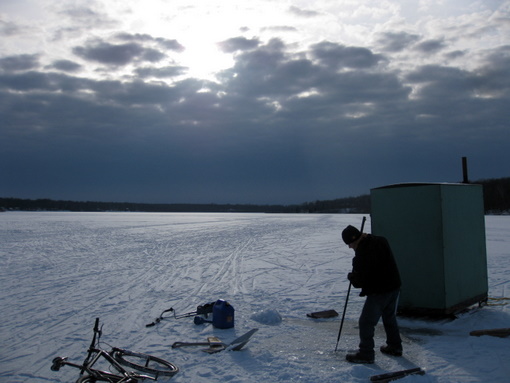 Setting up the Maplelag fish house before the storm rolled in from the south.