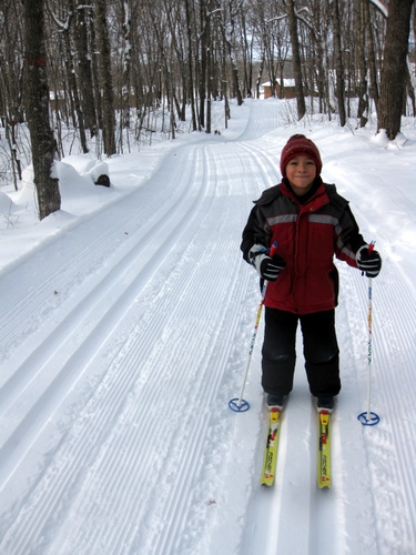 First time skier Adrian all smiles on the trails today. 