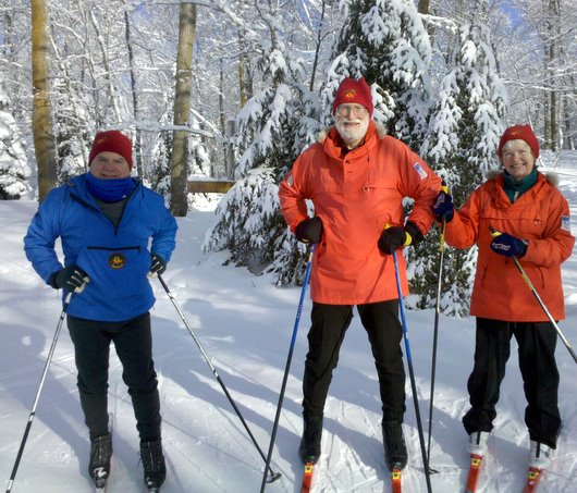 Roger Reede with Robert and MaryAnn Eliason at the trailhead ready for a snowy ski.