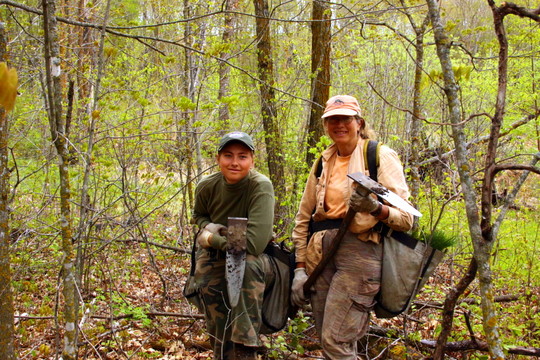 Kira and Anna Reoh taking a short break this week while planting over 2300 trees in the Maplelag woods.