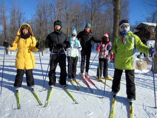 Ski instructor Ethan giving first time skiers, Lin family, a lesson. January 2nd, 2014.