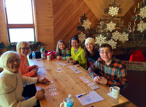 Members of the Pratt family enjoying some game time in the dining room. December 29th, 2014.