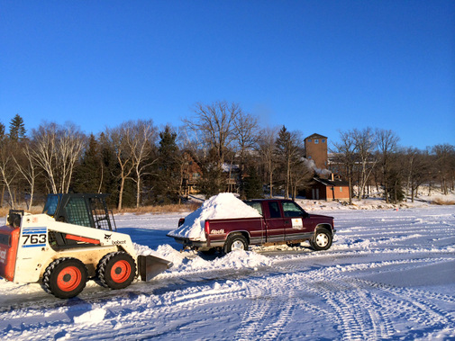 Hauling snow from the lake to the trail. We have hauled over 30 loads of snow to the trail! January 13th, 2015.
