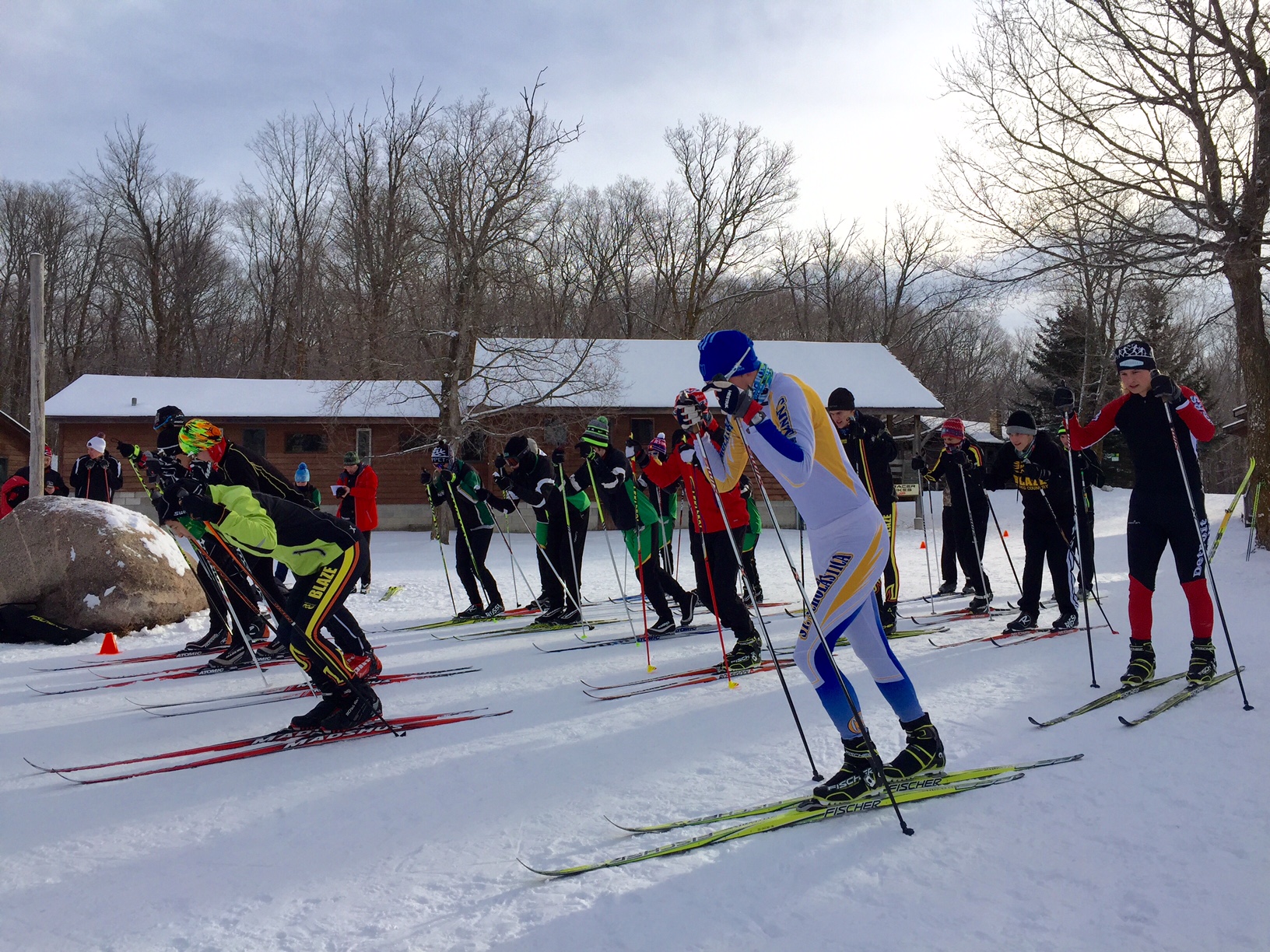 Skiers from Edina, Burnsville, Detroit Lakes and St Scholastica off the line for a friendly skiathlon. December 28th, 2015.