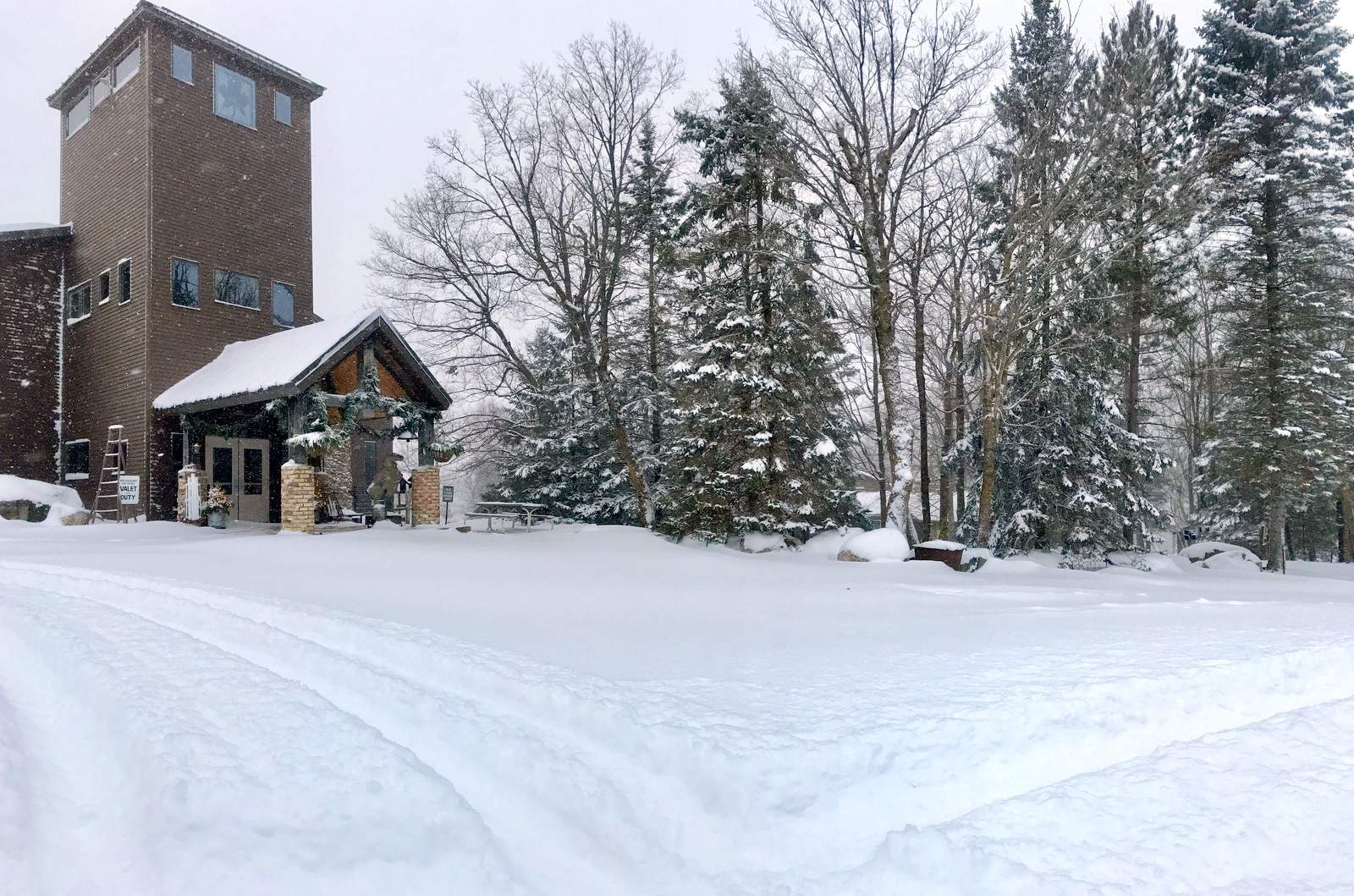 Snowy scene in front of the lodge, December 7th, 2016.
