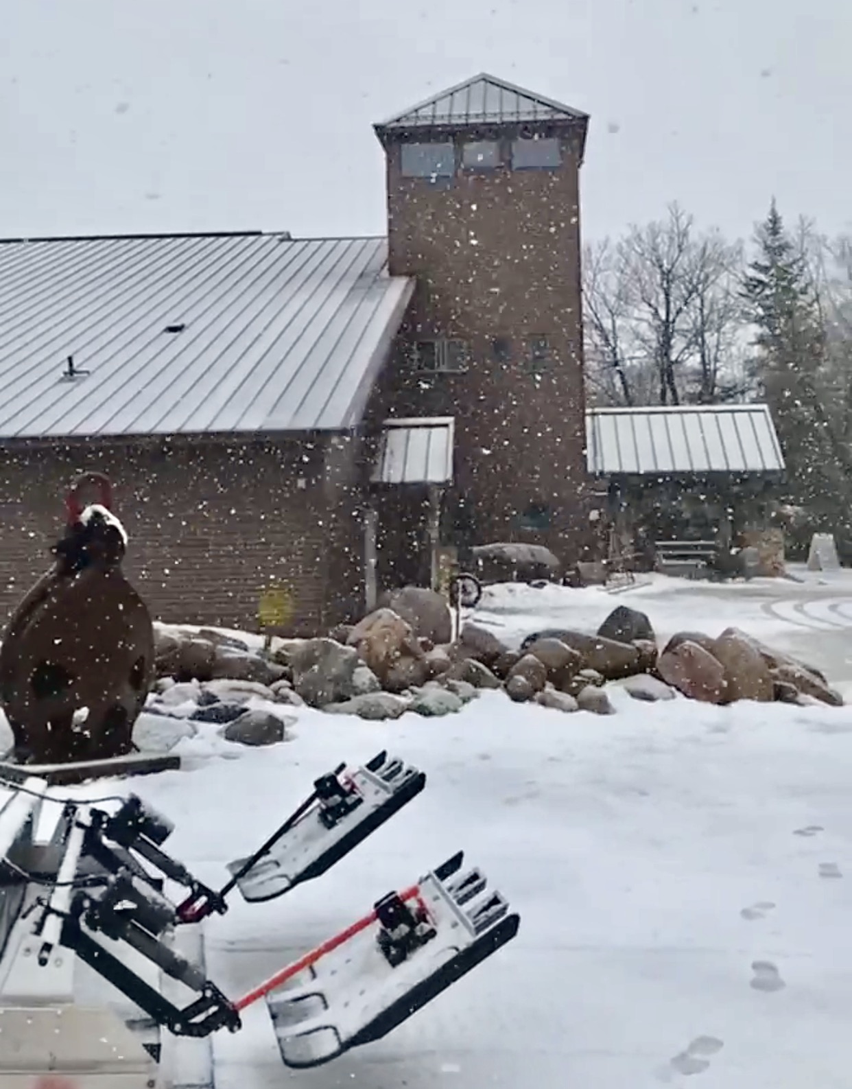 Snow falling Wednesday afternoon, February 21st, 2017. Very wet and sticky on top of wet base. After it cools down and freezes, we can groom select trails. Just this little bit should improve conditions. 