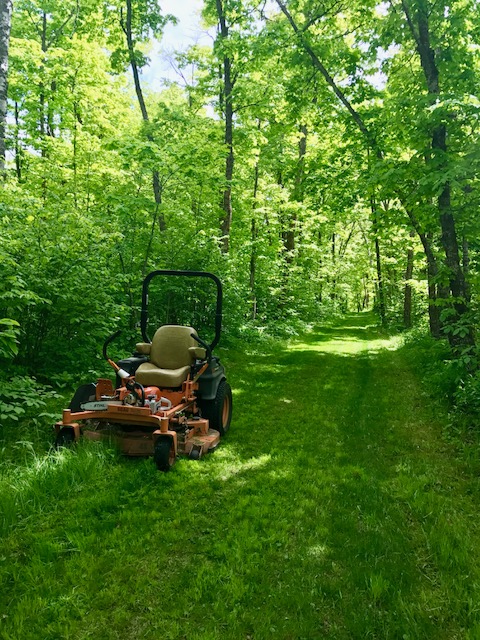 Mowing on a ski trails segment of the bike course, May 24th, 2017.