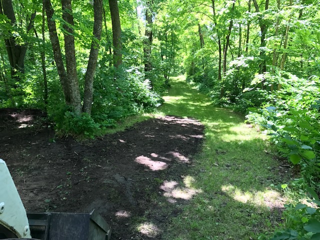 Removing rocks and filling in low spots on Sukkerbusk. July 7th, 2017. Trail tuning will continue through the summer and fall until the snow flies. 